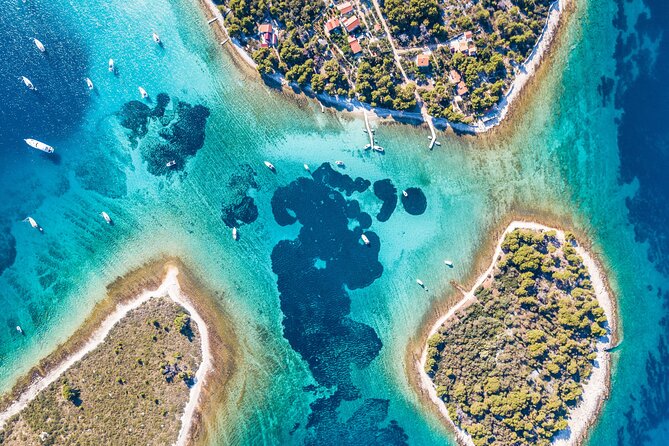 Blue Lagoon & 3 Islands Private Boat Tour - Trogir: stone lanes and a cathedral tower