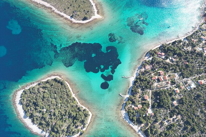 Blue Lagoon Tour from Split with Bottled Water and Wine Included - Čiovo Island: pine trees and beach time