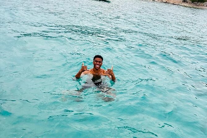 Blue Lagoon Tour from Split with Bottled Water and Wine Included - Friendly guides, music, and a social mood