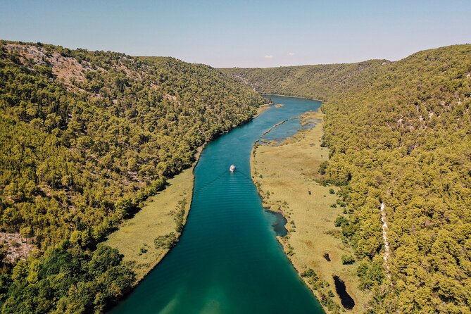 From Split: Krka Waterfalls Tour, Boat Cruise & Swimming - Walking the waterfall boardwalks