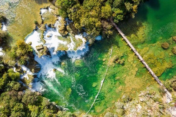 From Split: Krka Waterfalls Trip with Boat Cruise and Swimming - The April and May version includes Trogir
