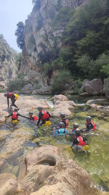 From Split/Omiš: Canyoning Cetina River + Free Photos/Video - The waterfall beneath the rock walls