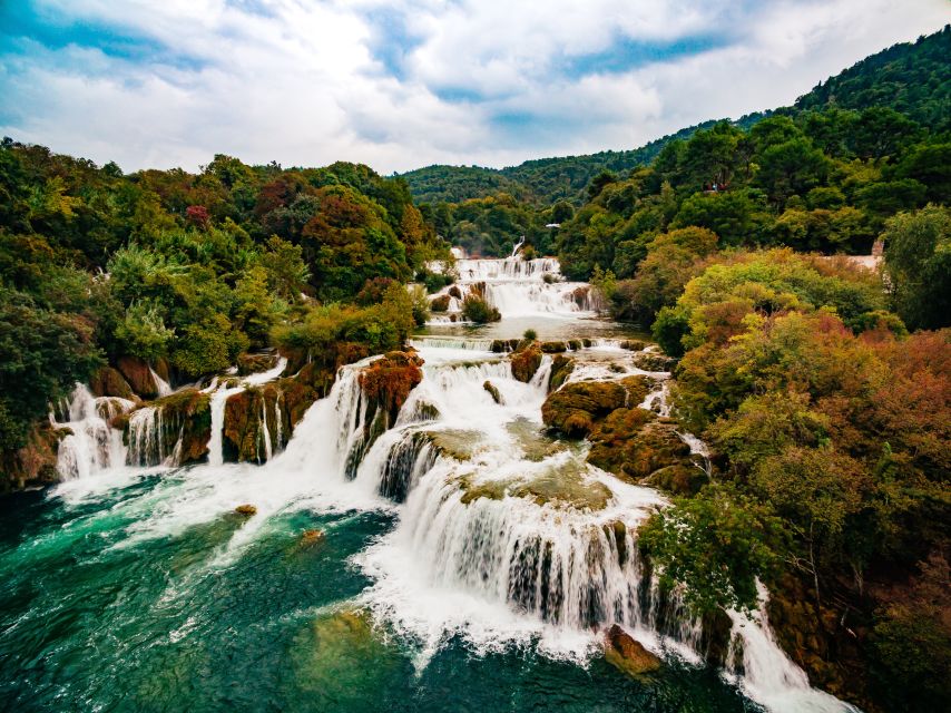 From Split & Trogir: Krka Waterfalls Day Tour with Boat Ride - The ride from Split or Trogir