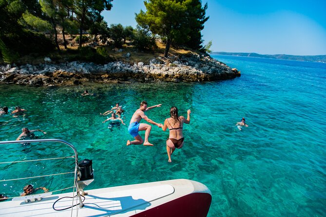 Full-Day Catamaran Cruise to Hvar & Pakleni Islands with Food and free Drinks - Lunch, the Pakleni Islands, and a second swim