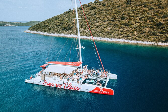 Full-Day Catamaran Cruise to Hvar & Pakleni Islands with Food and free Drinks - Leaving Split for the first swim near Brač