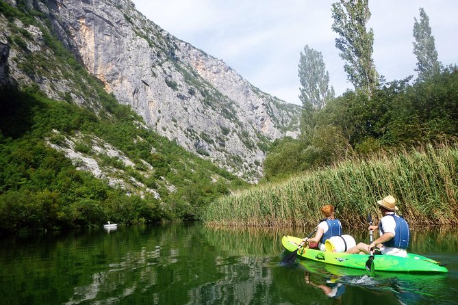 Kayaking and Snorkeling in Omiš - Paddling through the wide Cetina Canyon