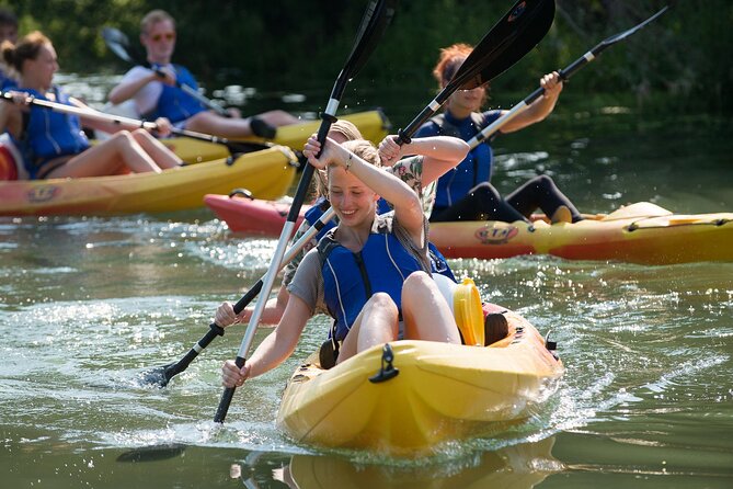 Kayaking in the Adriatic Sea with Snorkeling from Podstrana - Stobrec, limestone cliffs, and traditional houses