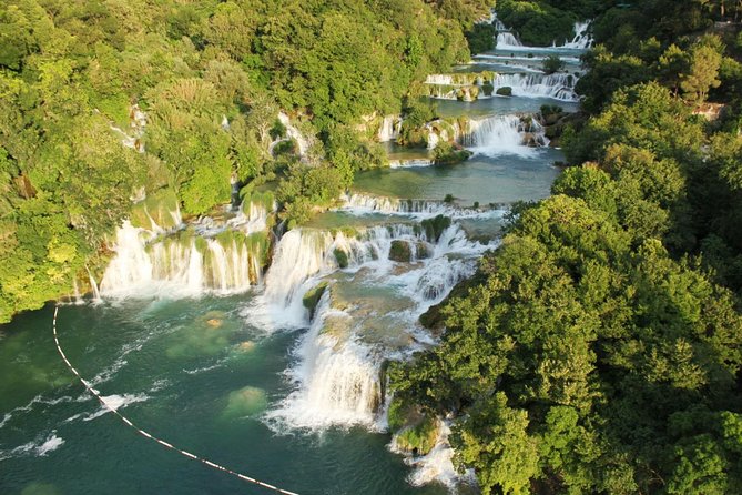 Krka National Park & Primošten Tour from Split or Trogir - Wooden paths lead to Skradinski Buk