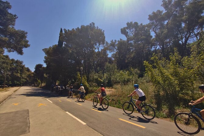 Marjan Park & Split City Bike Tour - Riding past the Riva and green market