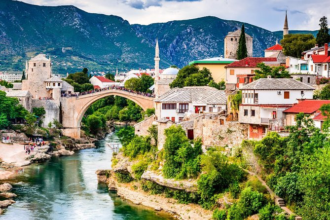Mostar and Herzegovina Tour with Kravica Waterfall from Split & Trogir - Kravica Falls: swimming, stairs, and crowds