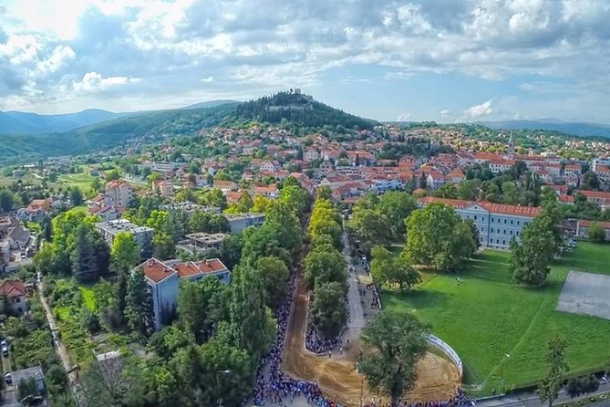 Sinj: Panoramic Flight over Peruca Lake and Dinara mountain - The small lake with a bottomless-looking center