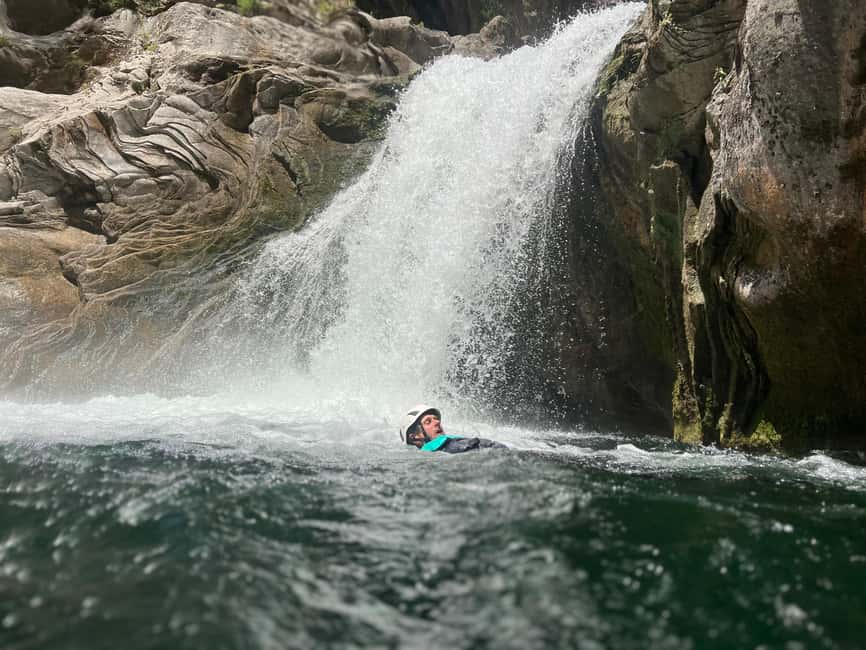 Small Group Canyoning with proffesional guide - Getting fitted with a wetsuit, helmet and harness