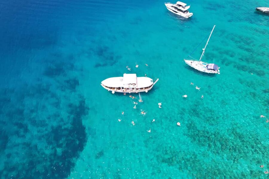 Split: Blue Lagoon and Šolta Boat Tour with Lunch and Drinks - The Blue Lagoon: Color, Fish, and Open Water