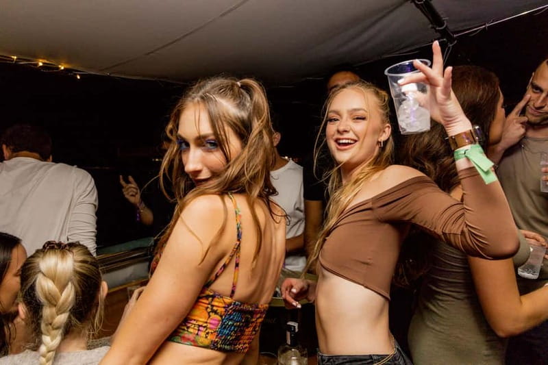Split: Boat Crawl with Nightclub Access, Shots, & Boat Party - Three stops, three different moods