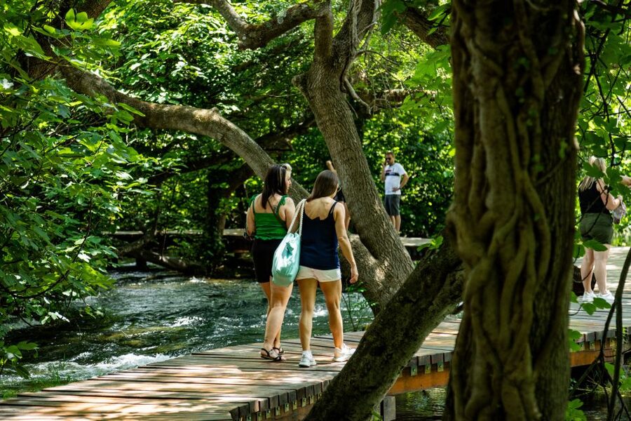 Split: Krka National Park Day Trip with Boat Ride & Swimming - What the park feels like in different seasons