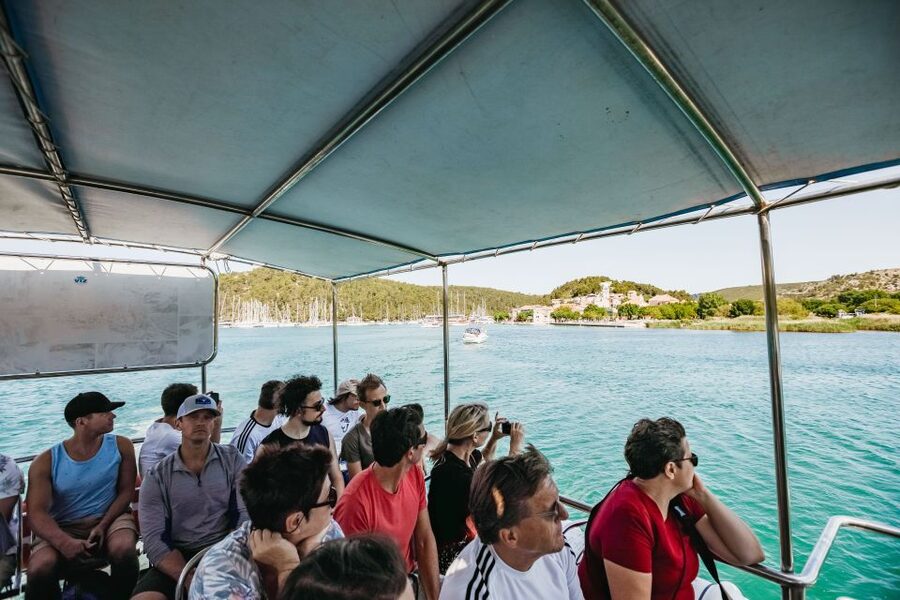 Split: Krka Waterfalls Trip with Boat Cruise and Swimming - Guides, timing, and the group experience