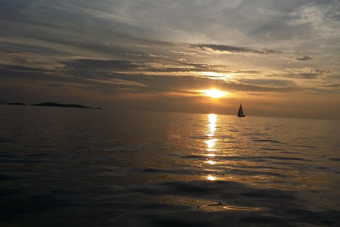 Split: Small-Group Sunset Sailing Trip - A sunset view of Split from a small sailboat