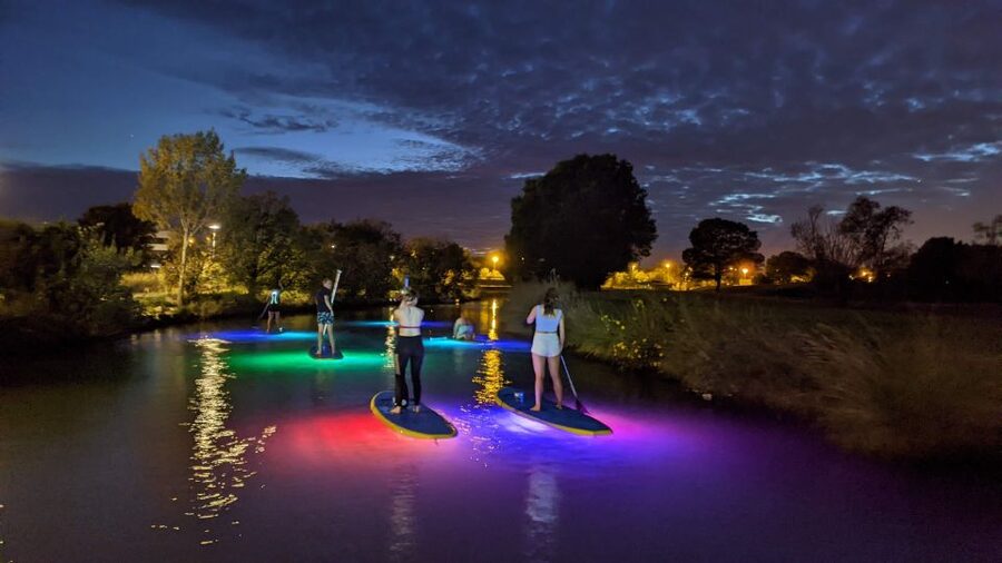 Split: Stand Up Paddleboard Night Glow Tour - Entering the river beneath the stars