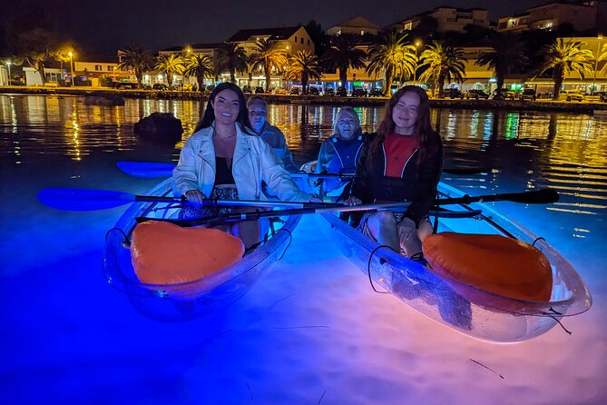 Transparent Kayak Glow Tour in Split - Back on the sea beside white rocks and old homes