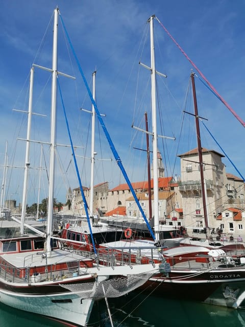 Trogir; Private walking tour of higlights of Trogir - The Riva, palms, and anchored boats